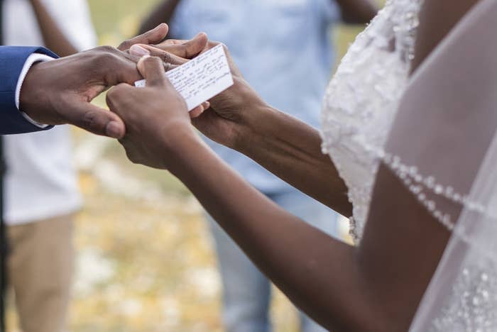 A bride and groom holding hands