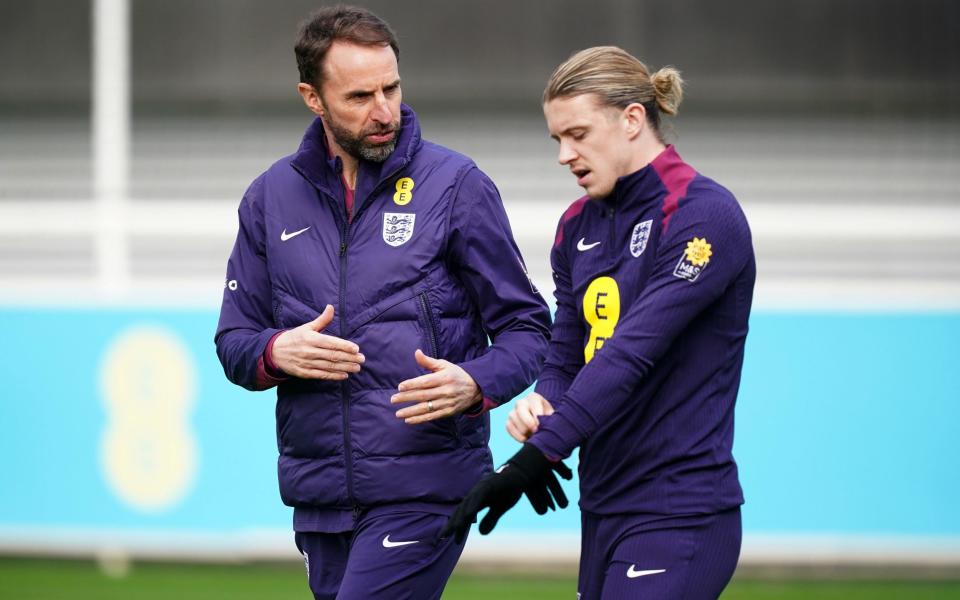 England manager Gareth Southgate at St. Petersburg upon Trent.  With Conor Gallagher during a training session at George's Park