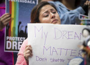 <p>Evelin Hernandez cries as she hold a sign reading “My dreams matter. Don’t shatter them.” at a protest against the announcement that the Trump administration is ending the Deferred Action for Childhood Arrivals program, known as DACA, in Minneapolis, Minn., Tuesday, Sept. 5, 2017. Hernandez is a special education paraprofessional and a DREAM act recipient. (Photo: Renee Jones Schneider/Star Tribune via AP) </p>