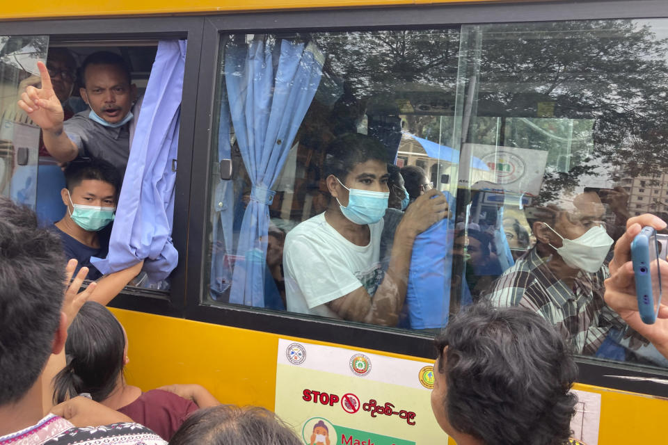 Released prisoners on a bus leave from Insein Prison in Yangon, Myanmar Wednesday, May 3, 2023. Myanmar’s ruling military council says it is releasing more than 2,100 political prisoners as a humanitarian gesture. Thousands more remain imprisoned on charges generally involving nonviolent protests or criticism of military rule, which began when the army seized power in 2021. (AP Photo/Thein Zaw)