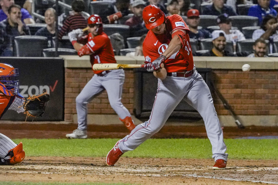 Cincinnati Reds' Hunter Renfroe swings at a pitch during the ninth inning of a baseball game against the New York Mets, Saturday, Sept. 16, 2023, in New York. (AP Photo/Bebeto Matthews)