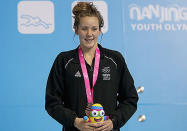 Bobbi Gichard of New Zealand poses for a photo after winning the bronze medal of the Women's 100m Backstroke Final on day two of Nanjing 2014 Summer Youth Olympic Games.