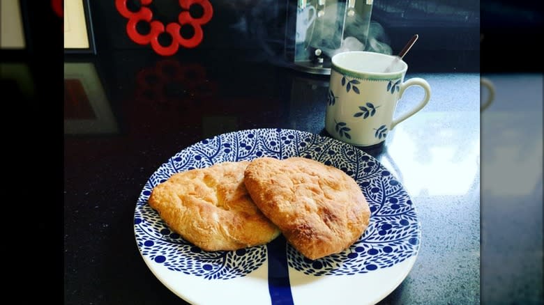 Butteries on plate and tea