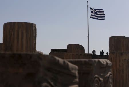 A Greek national flag flutters in Athens May 13, 2015. REUTERS/Alkis Konstantinidis