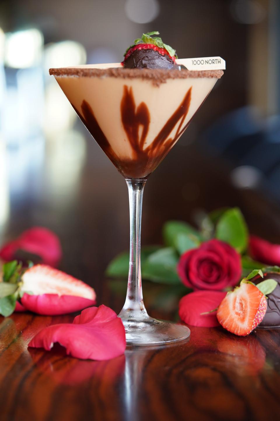 The Goodnight Kiss at 1000 North is made with Tito's Vodka, strawberry cream, dark chocolate liquor, chocolate drizzke and a chocolate-covered strawberry.