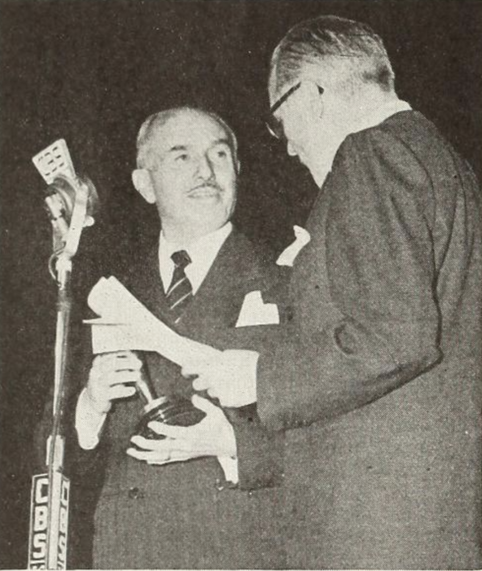 Jack Warner with the Casablanca Oscar, from <em>Motion Picture Herald</em> on March 11, 1944.<br>