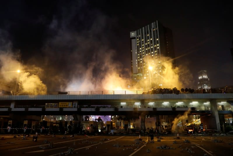 Protesters clash with police outside Hong Kong Polytechnic University (PolyU) in Hong Kong