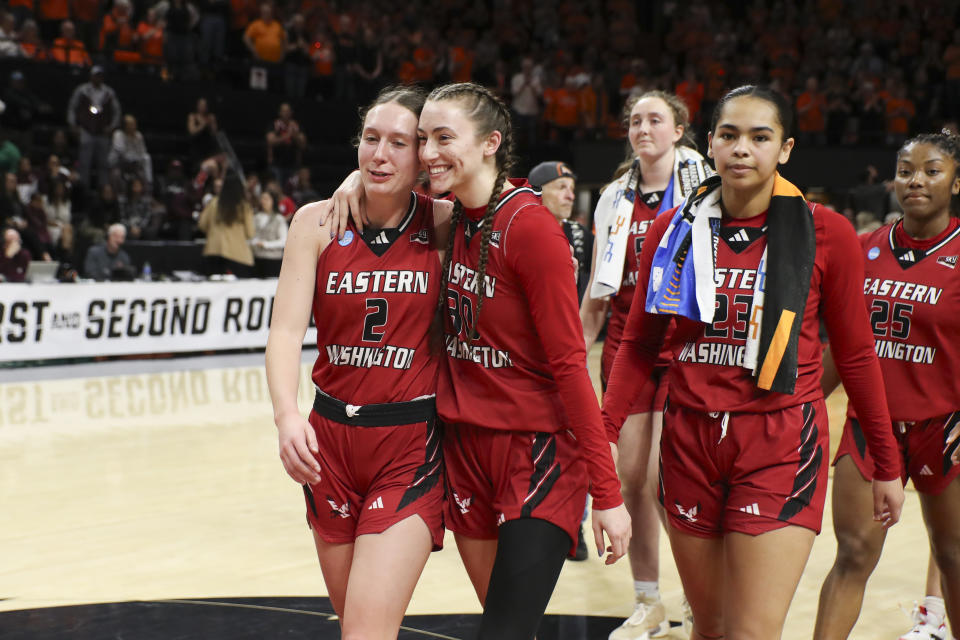 Eastern Washington guards Ella Gallatin (2) and Gabrielle Jung (30) react following their loss to Oregon State in a first-round college basketball game in the women's NCAA Tournament in Corvallis, Ore., Friday, March 22, 2024. (AP Photo/Amanda Loman)