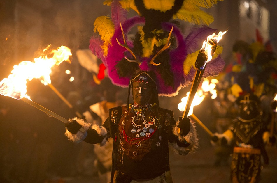 <em>People dress up in various costumes for the celebrations in Lewes (Rex)</em>