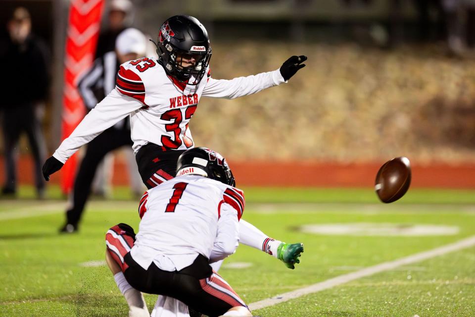 Weber High School’s Alex Johnson’s kick for the extra point is blocked and bounces back during the game against Davis High School in the second round of the Class 6A state tournament for high school football at Davis High School in Kaysville on Friday, Oct. 27, 2023. | Megan Nielsen, Deseret News