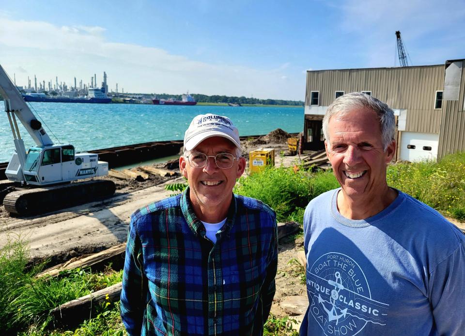 Hale and Mark Walker stand outside the former Gibraltar building at 3592 Military St., where a small harbor has been under construction for a few months, on Thursday, Aug. 17, 2023.