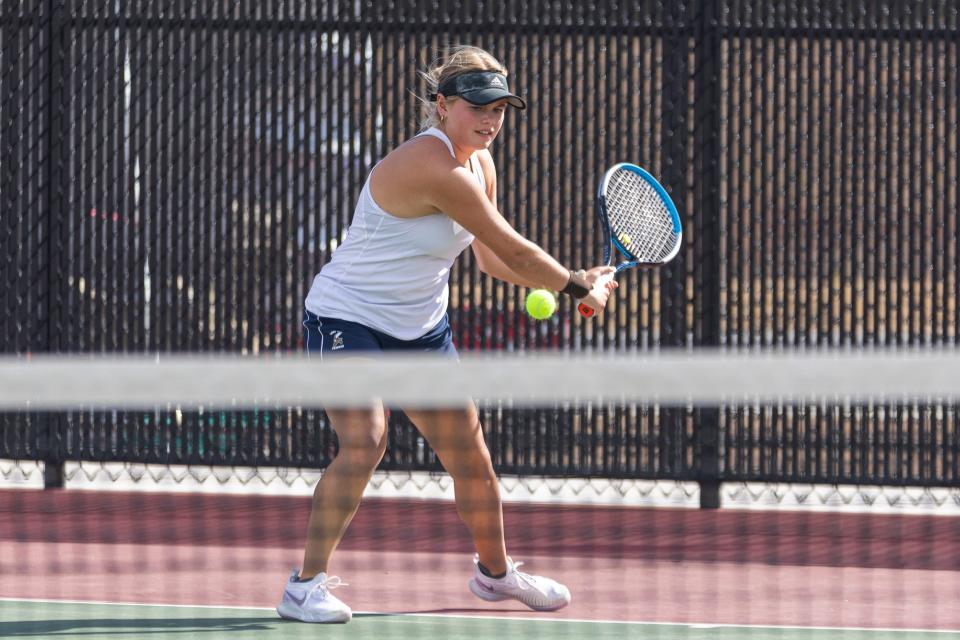 Lauren Sweeney representing Seaman during the 2022 Class 5A state tennis tournament.