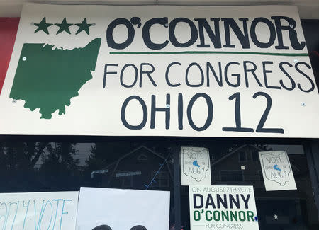 A sign hangs in the window of Democratic candidate Danny O'Connor's campaign office in Clintonville, Ohio, U.S., July 15, 2018. Picture taken July 15, 2018. O'Connor is taking on Republican Troy Balderson in a special election in Ohio's 12th congressional district on August 7. REUTERS/Tim Reid