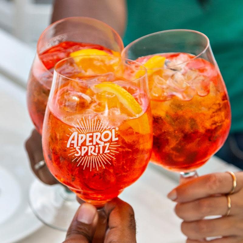 <p>Kelli Acciardo</p><p>There’s nothing to send you straight on a voyage to the Amalfi Coast, faster that one sip of an Aperol Spritz.</p><p><strong>Get the <a href="/1252849/kelli_acciardo/aperol-spritz/" data-ylk="slk:full Aperol Spritz recipe here;elm:context_link;itc:0;sec:content-canvas" class="link rapid-noclick-resp">full Aperol Spritz recipe here</a>.</strong></p><p>• 2 oz Aperol<br> • 3 oz Cinzano Prosecco<br> • 1 oz soda water<br> • Ice<br> • Slice of orange, for garnish</p>