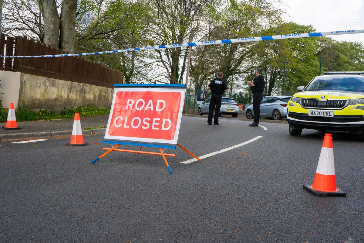 Police at the scene in Bodmin after the fatal stabbing on Sunday (SWNS)