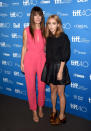 <p>Co-stars Sandra Bullock and Zoe Kazan stuck close at the “Our Brand Is Crisis” press conference at the 2015 Toronto International Film Festival. While Kazan was super casual in a black skirt and leather brogues, Bullock, on the other hand, popped in a bright pink jumpsuit.</p>