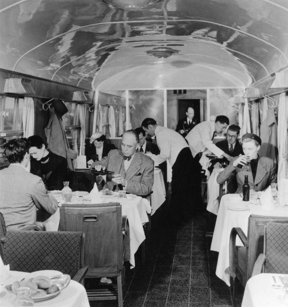 A first-class dining car on a train in 1951