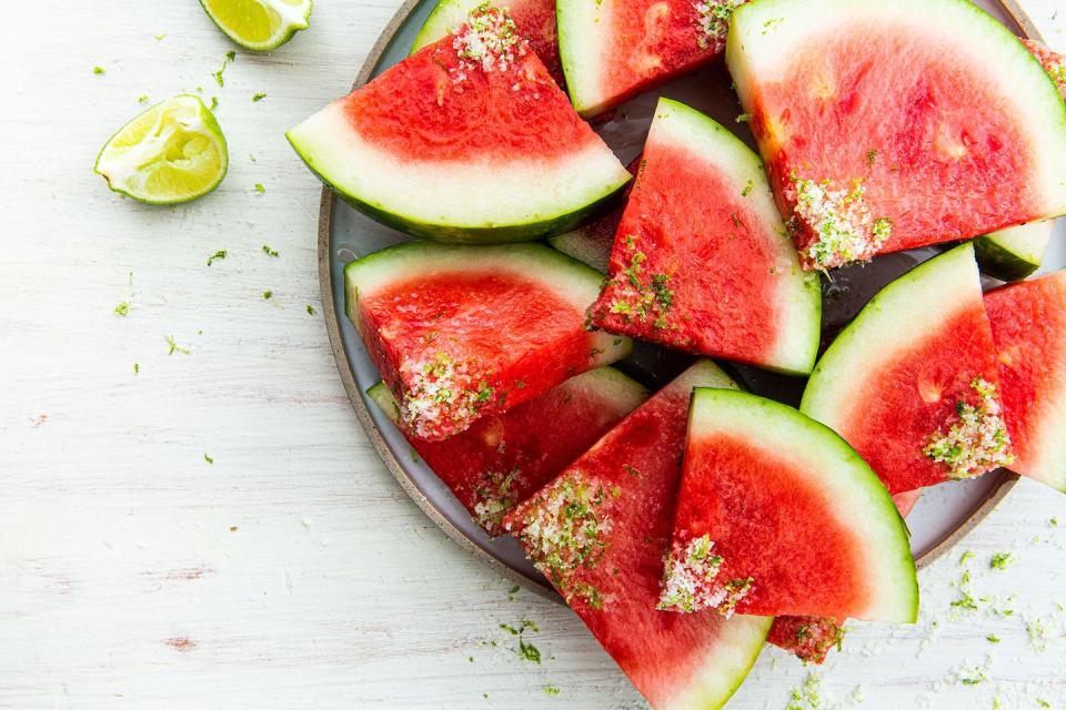 <p>Technically this isn't a drinkable cocktail but we soaked these watermelon slices with all the ingredients of a margarita. A perfect BBQ drink... snack? Who cares!</p><p>Get the recipe from <a href="https://www.delish.com/cooking/recipe-ideas/recipes/a53617/margarita-watermelon-recipe/" rel="nofollow noopener" target="_blank" data-ylk="slk:Delish;elm:context_link;itc:0;sec:content-canvas" class="link ">Delish</a>.</p>