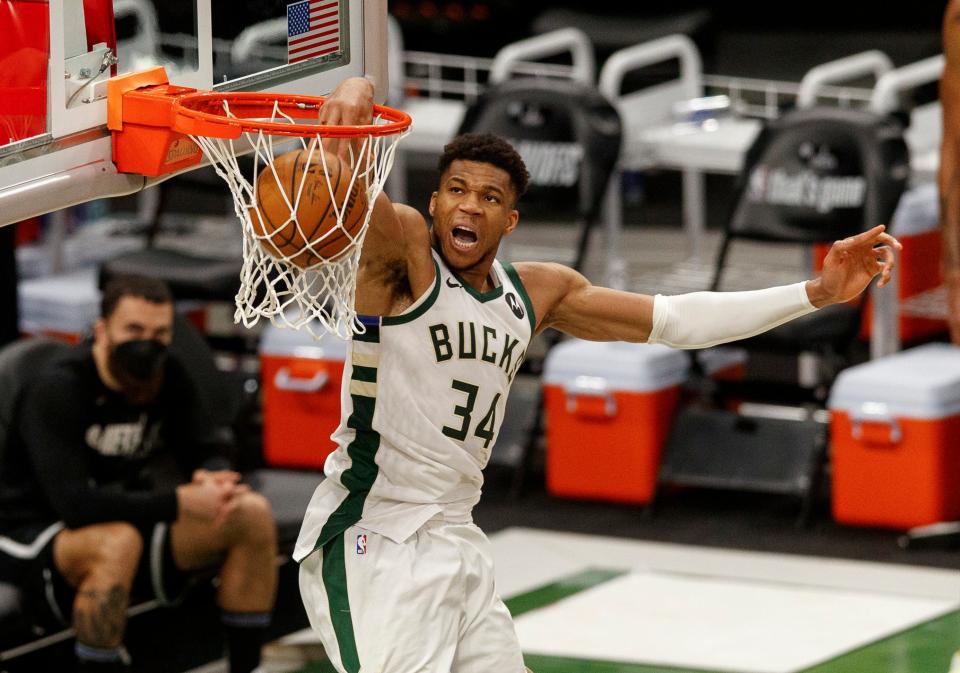 Milwaukee Bucks forward Giannis Antetokounmpo dunks during the fourth quarter against the Brooklyn Nets during Game 4.