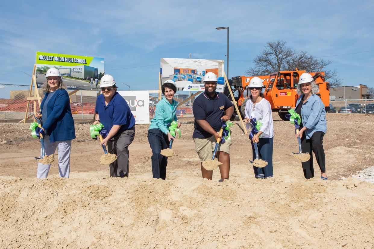From left to right: Nicolet Union High School board members Libby Gutterman, Andrew Franklin, Marilyn Franklin, Representative Darrin Madison, Nicolet Union High School board members Theresa Seem and Dr. Leigh Wallace Tabak participate in a groundbreaking ceremony April 13. The ceremony officially kicked off construction of $77.4 million worth of facilities projects that voters approved in April 2022 in a facilities referendum.
