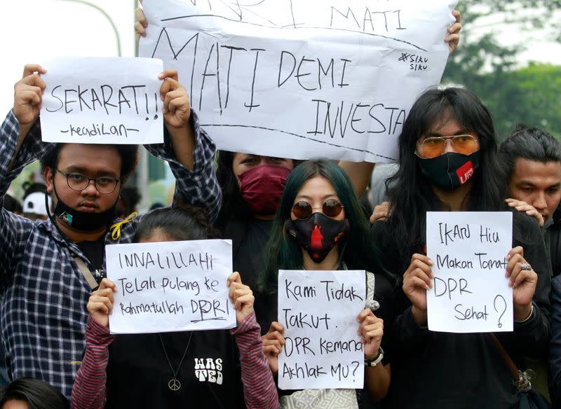 University students protest the government's labour reforms bill in Jakarta