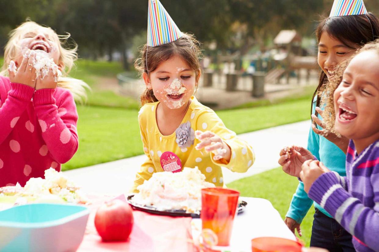 Kids at Birthday Party with Cake on Faces