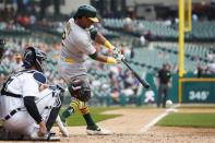 May 16, 2019; Detroit, MI, USA; Oakland Athletics designated hitter Khris Davis (2) hits a single in the fifth inning against the Detroit Tigers at Comerica Park. Mandatory Credit: Rick Osentoski-USA TODAY Sports