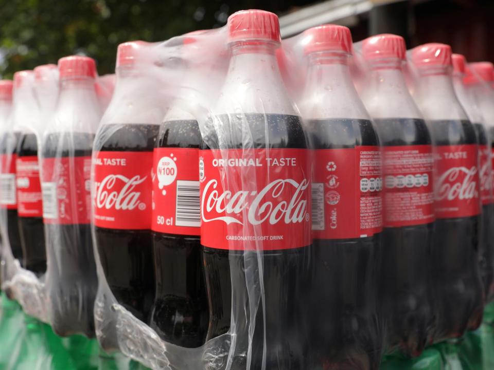 coca cola bottles in plastic packaging