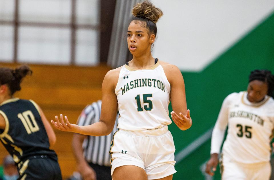 Washington's Mila Reynolds (15) reacts to a call during the Washington vs. Penn girls basketball game Friday, Nov. 19, 2021 at Washington High School. 