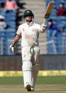 Cricket - India v Australia - First Test cricket match - Maharashtra Cricket Association Stadium, Pune, India - 24/02/17. Australia's captain Steve Smith celebrates his half century. REUTERS/Danish Siddiqui