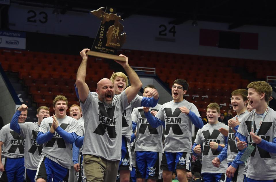 Dundee head coach Tim Roberts show the excitement after winning the Division 3 Championship in 2018 over Richmond 40-15.