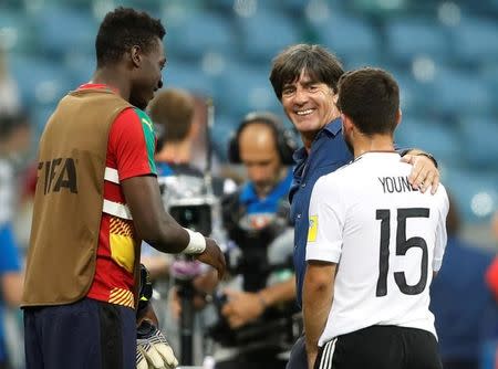 Soccer Football - Germany v Cameroon - FIFA Confederations Cup Russia 2017 - Group B - Fisht Stadium, Sochi, Russia - June 25, 2017 Germany coach Joachim Low and Amin Younes celebrate after the match REUTERS/Carl Recine