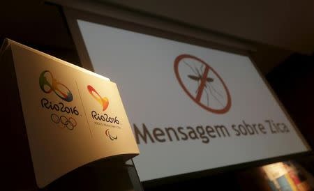 The logos of the Rio 2016 Olympic Games and Rio 2016 Paralympic Games are pictured next to a message on a screen that reads "Message about Zika" during a media briefing in Rio de Janeiro, Brazil, February 2, 2016. REUTERS/Ricardo Moraes