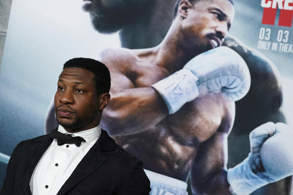 Jonathan Majors arrives at the premiere of "Creed III" on Monday, Feb. 27, 2023, at TCL Chinese Theatre in Los Angeles. (Photo by Jordan Strauss/Invision/AP)