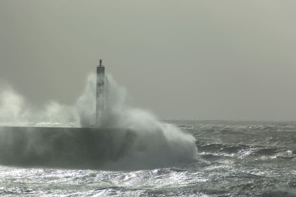 Aberystwyth, Wales, UK. Aberystwyth promenade being hit by the St Jude gale force winds on Sunday October 27th 2013. © Barry Wa