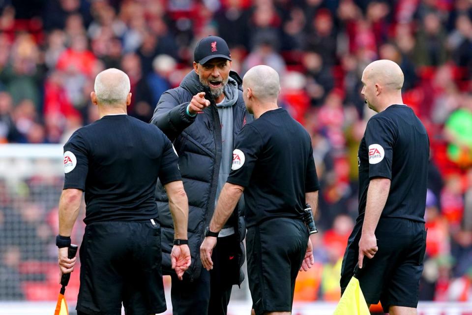 Liverpool manager Jurgen Klopp confronts referee Paul Tierney (PA Wire)