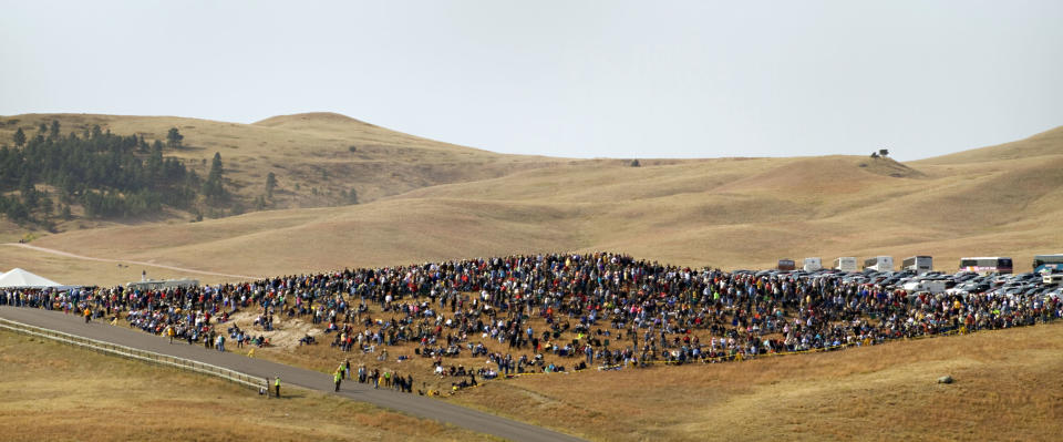 More than 1,000 buffalo thunder across the prairie land Monday, Sept. 24, 2012, during the 47th annual Buffalo Roundup in western South Dakota's Custer State Park. Event organizers estimate that more than 14,000 people attended the event. (AP Photo/Kristi Eaton)