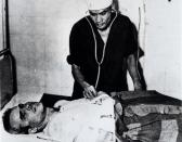 <p>John McCain after his capture, treated in a Hanoi hospital. (Photo: AP) </p>