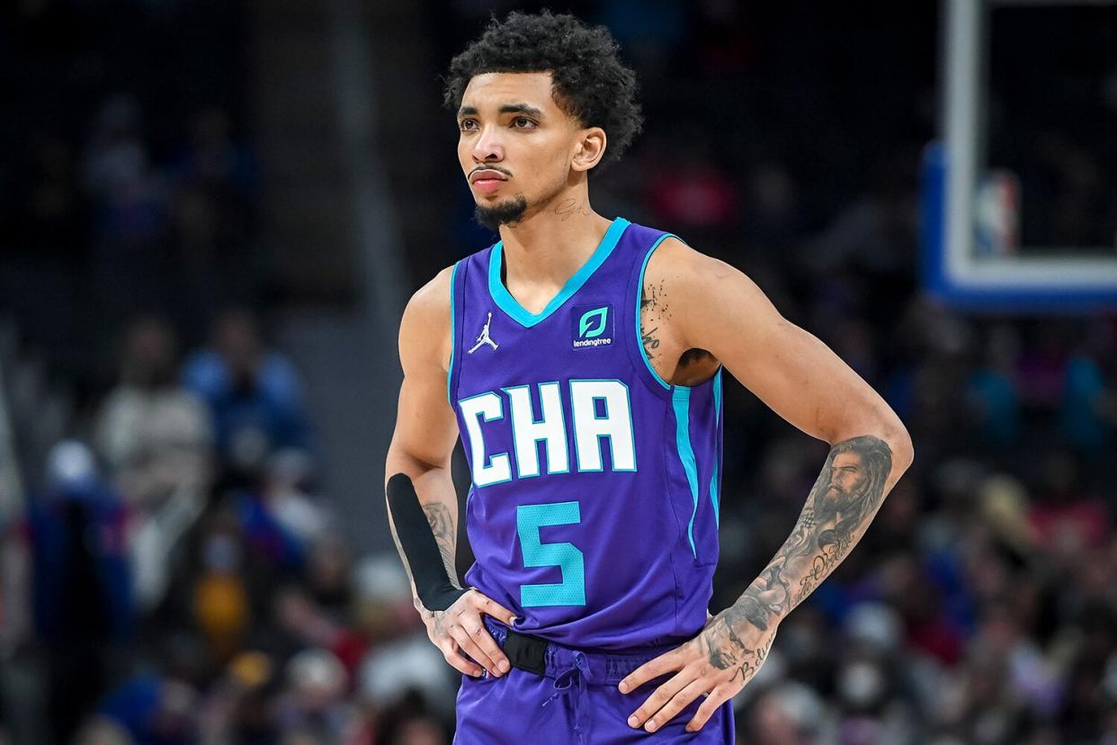 James Bouknight #5 of the Charlotte Hornets looks on against the Detroit Pistons during the first quarter at Little Caesars Arena on February 11, 2022 in Detroit, Michigan.