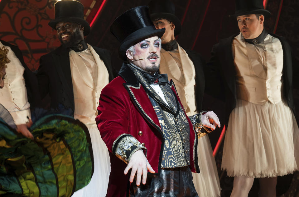 Boy George, center, is pictured on stage during the curtain call for his debut performance in "Moulin Rouge! The Musical" at the Al Hirschfeld Theatre on Tuesday, Feb. 6, 2024, in New York. (Photo by Evan Agostini/Invision/AP)