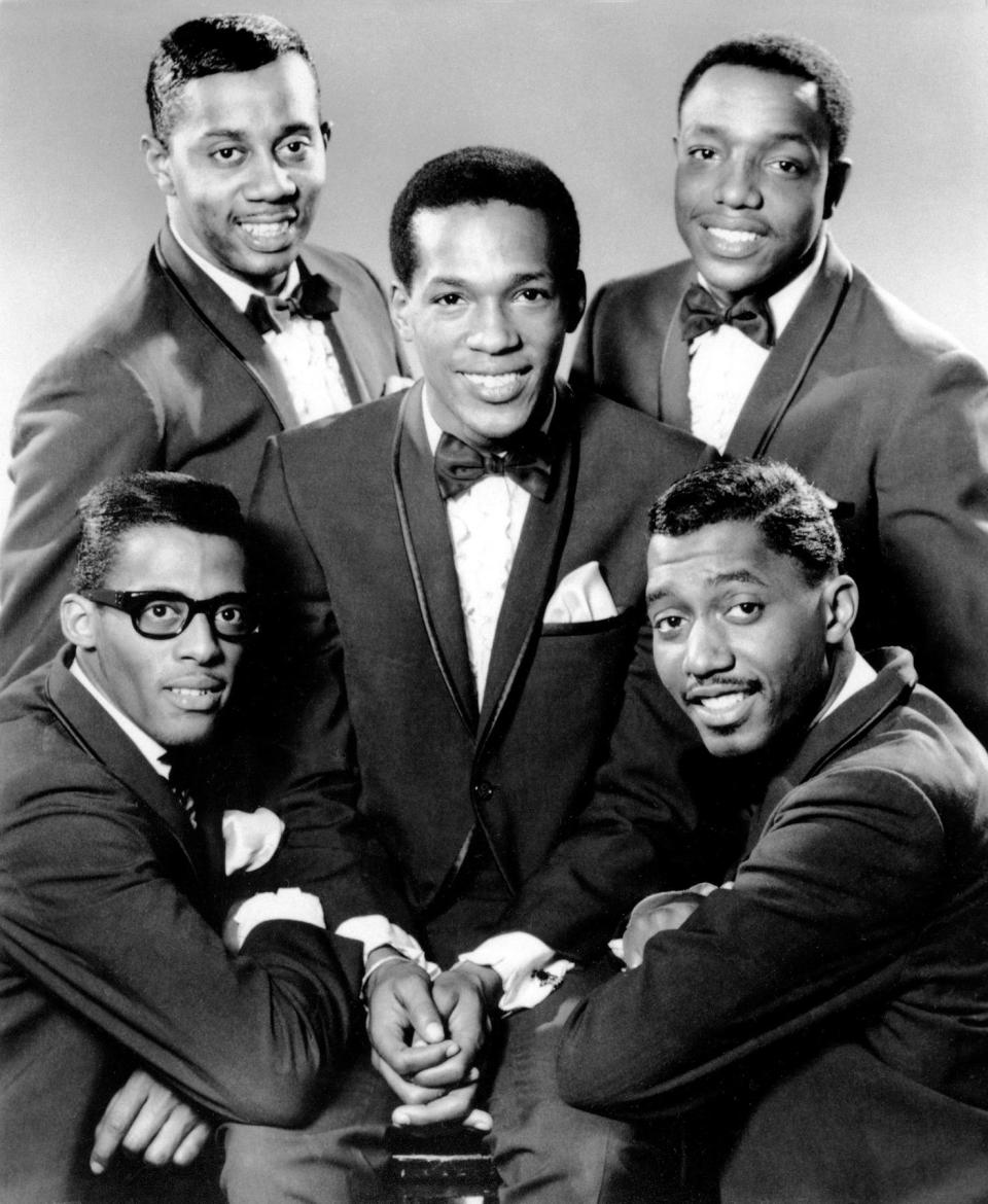 This 1966 photo shows the rhythm and blues group "The Temptations."  Clockwise from bottom left are David Ruffin, Melvin Franklin, Paul Williams, Otis Williams, and in the center, Eddie Kendricks.