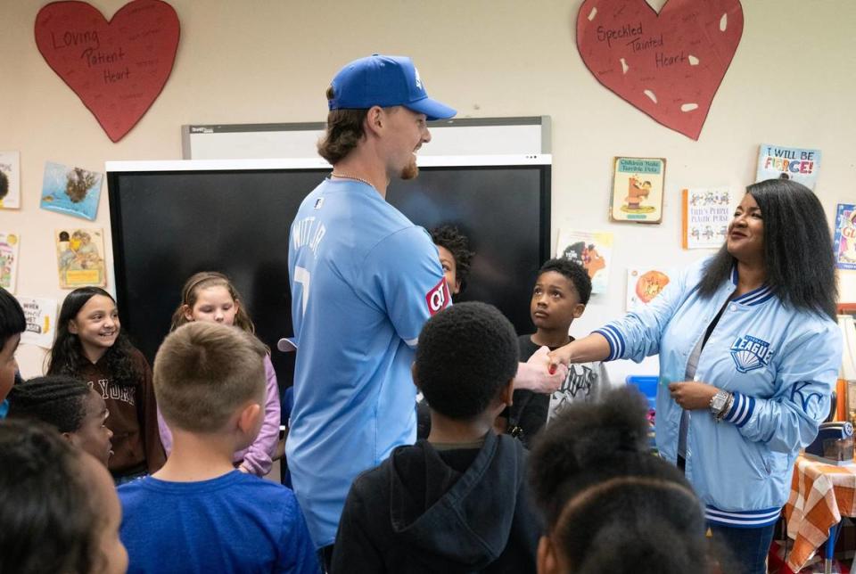 Royals star shortstop Bobby Witt Jr. greets teacher Kellee Ransom, right, during visit to her second-grade classroom to promote literacy on Tuesday, May 21, 2024, at Ingels Elementary School in the Hickman Mills School District.