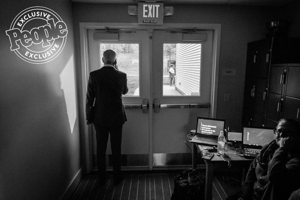 Biden takes a call just before going to stage at the McIntyre Ski Area in Manchester, New Hampshire, where he called for further inquiries into President Trump's Ukraine calls, on Oct. 9, 2019.