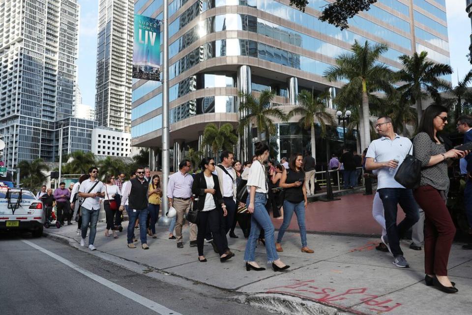 People evacuate office buildings in Miami | Joe Raedle/Getty