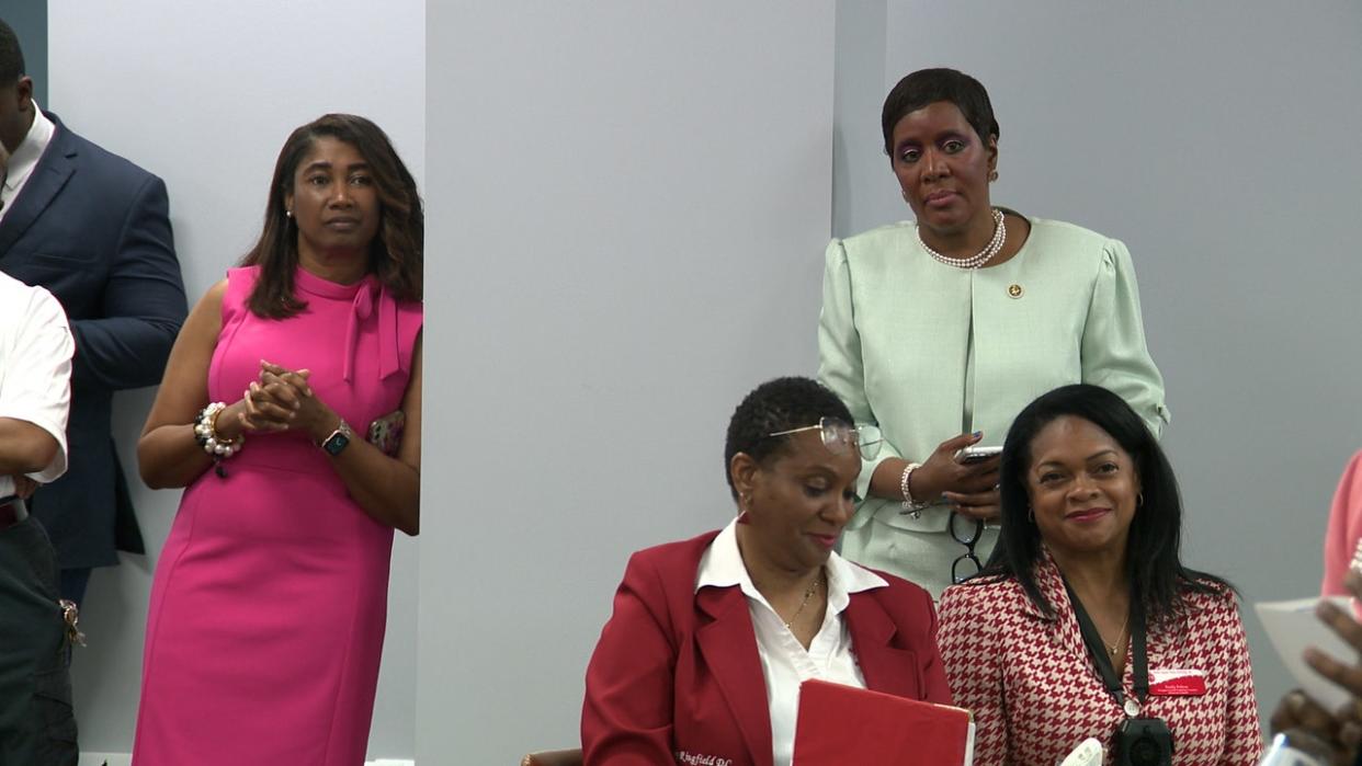 <div>Dr. Romona Jackson Jones (standing, right) faces Tarenia Carthan (standing, left) for the Democratic nomination for commission chair.</div>