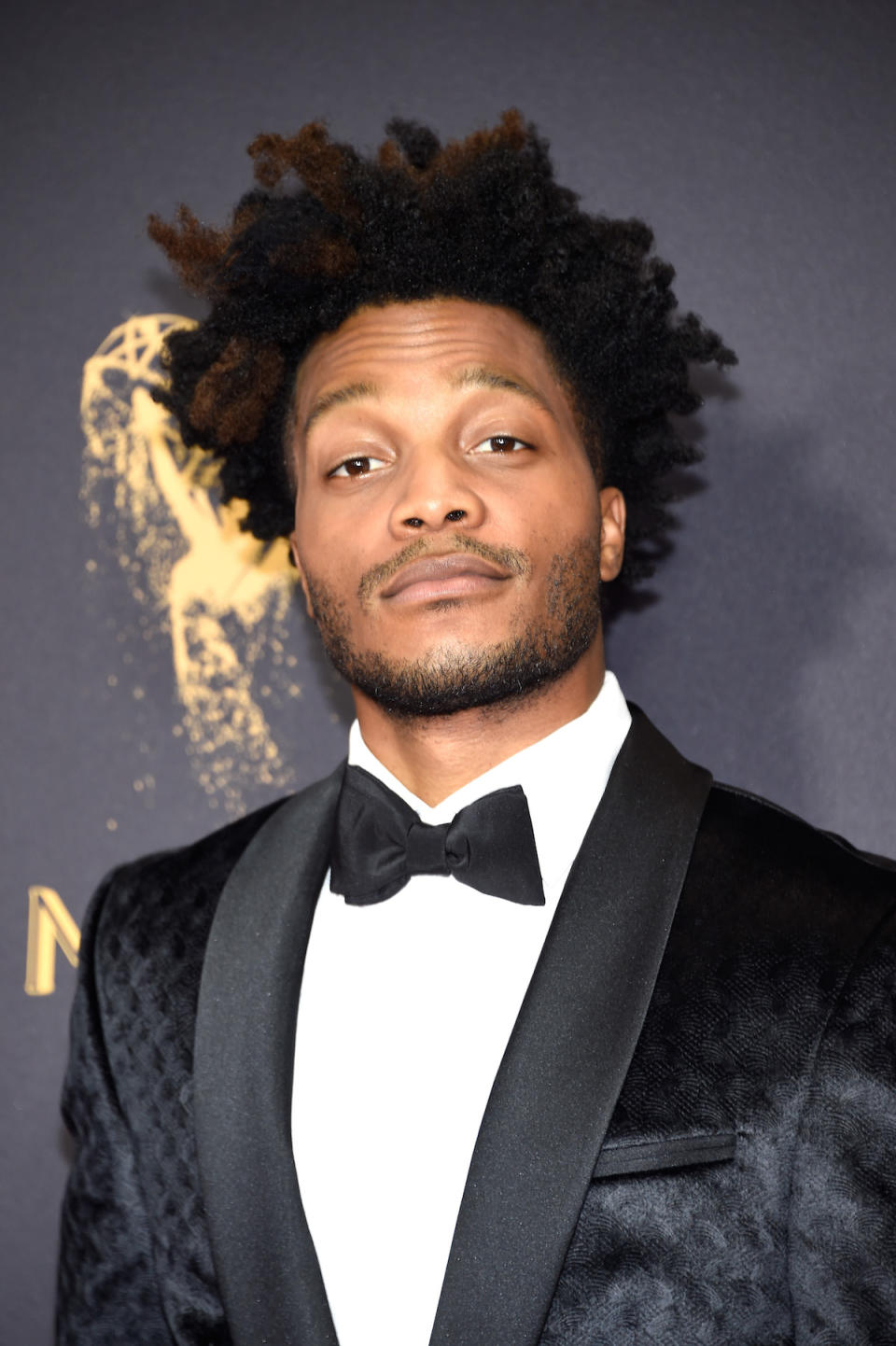 <p>Jermaine Fowler’s amazing two-toned ’fro is as captivating as his spiffy tuxedo. (Photo: Kevin Mazur/WireImage) </p>