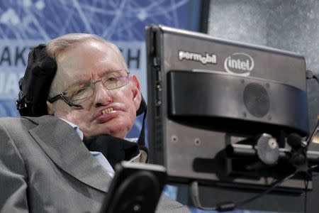 FILE PHOTO: Physicist Stephen Hawking sits on stage during an announcement of the Breakthrough Starshot initiative with investor Yuri Milner in New York April 12, 2016. REUTERS/Lucas Jackson