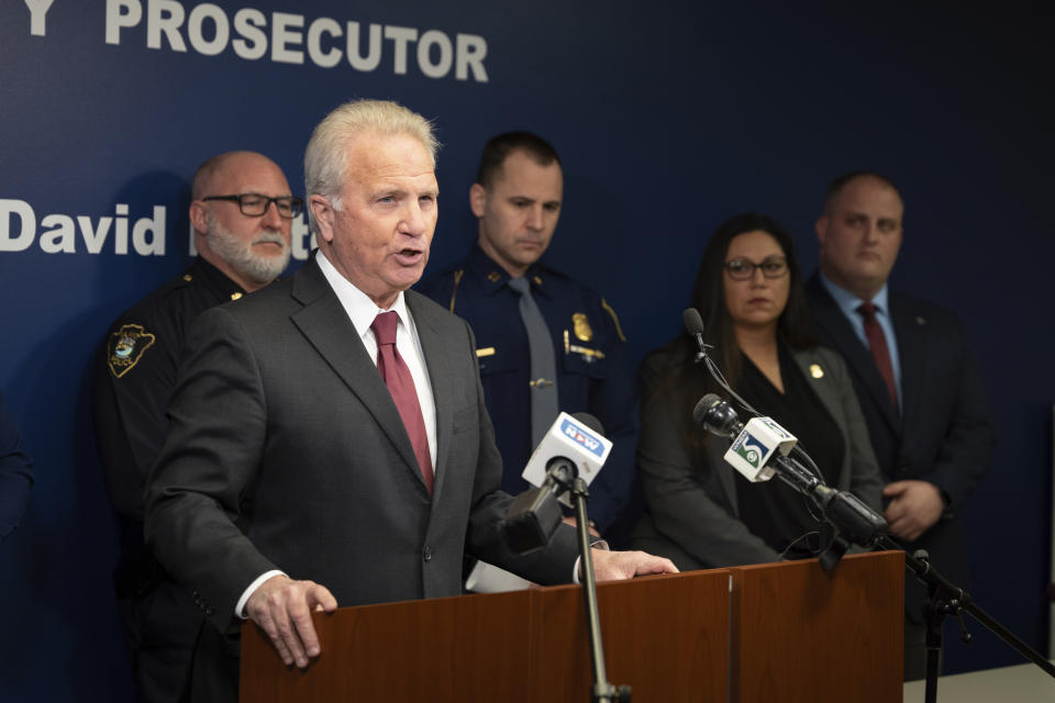 Genesee County Prosecutor David Leyton speaks during a press conference to announce criminal charges filed against a Flint father, after his 2-year-old daughter accidentally shot herself, held in the 67th District Court in downtown Flint, Mich., on Tuesday, Feb. 20, 2024. Under Michigan's new "safe storage" laws, this is the first criminal complaint filed. (Julian Leshay Guadalupe/The Flint Journal via AP)