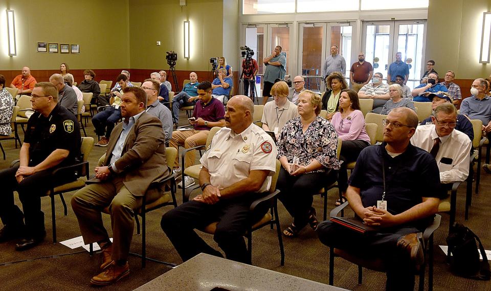 Attendees listen to Columbia city manager De'Carlon Seewood give the State of the City of Columbia address Thursday at City Hall.