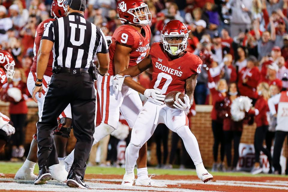 Oklahoma running back Eric Gray (0) celebrates after scoring a touchdown in the second half against TCU in Norman, Okla.